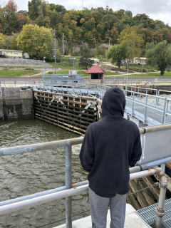 Son looking in the lock chamber where the boats and barges are raised or lowered as they travel up or down river.
