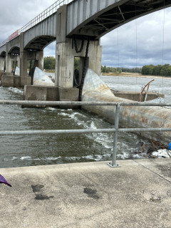 A view of the up river side of the gates. The position of these gate determines how much water is held back and therefore the depth of the river for navigation or flood control