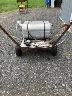 Sprayer nozzles on arms, motor and ball valves to direct liquid to nozzles, wand or to circulate liquid to mix chemicals.