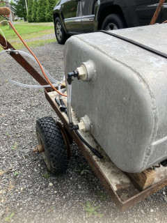 Sight hose on the side of tank for telling how much in the tank