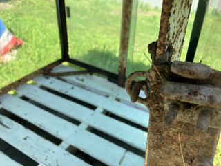 Window track hanging on hook.