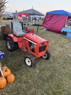 AC 710 pulling a wagon around