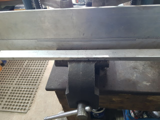 piece of flat bar and hammer to get nice clean edge on the hook