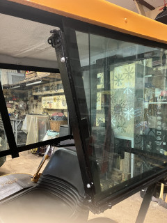 Frame swings up and latches