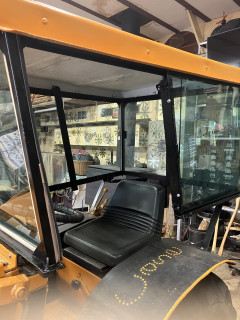 Opening to get in. Slide window back, frame swings up and latches.