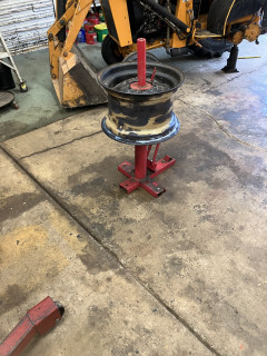 Wheel on tire machine primer painted