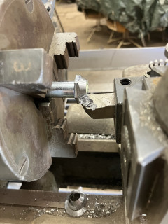 Chamfering bolt heads