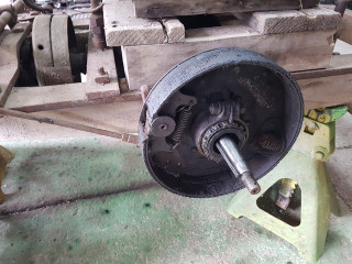 rear brakes and axle shaft .  the hub in the wheel locks on to a taper with key