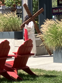 Jesus Christ dragging a cross.