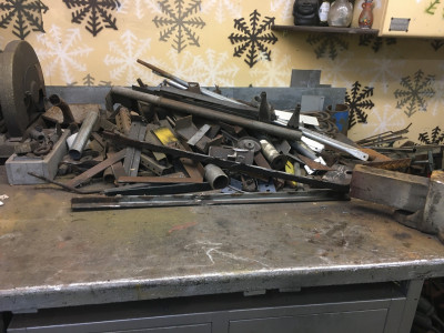 Main welding table that always has bits and pieces from old projects on it.