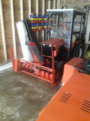Single stage case snowblower with chute extention and cutter bars.jpg