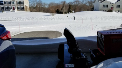 The high winds cleared some of my driveway out. This is the portion I normally have to shovel so I can get the tractor out.