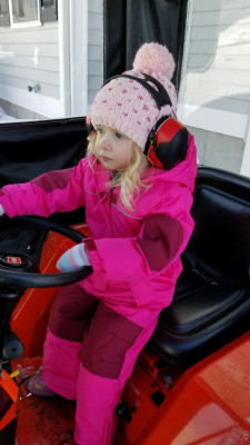 Here's my daughter Lily getting ready in the cab. She rode shotgun for the last third of the driveway. I kept her inside (out of the way) and warm until I was ready.