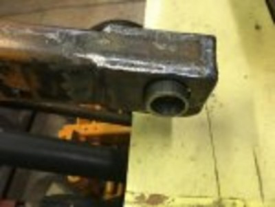 Larger hole XX pipe in loader arm.