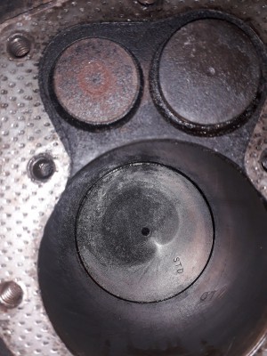 ring showing on piston.jpg