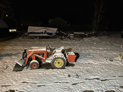 The 644 doesn't know what to think. &quot;First snow, and a backhoe waiting there for me in the background?&quot;