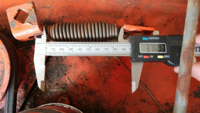 Standard belt tension. Tensioner spring is stretched 3.76".