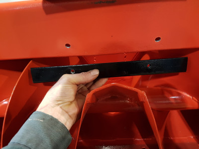 1 1/4" bed angle 12" long over bent to 85 degrees ,nuts welded to back side  . this is to keep the snow from building up on the back of the top plate