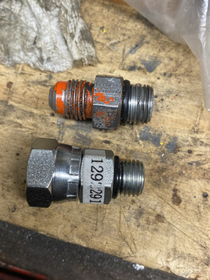 Original fitting, 5/16 JICM to ORB-5, and wrong replacement fitting, 1/4 NPTF to ORB-4. Later I got the right replacement fitting, 1/4 NPTF to ORB-5.