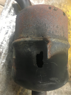 Hole in muffler