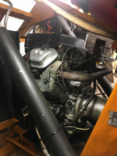 Left side engine bolted in place