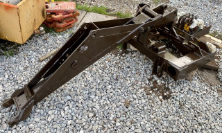 Part of the backhoe frame.