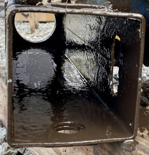 Taped a brush to a 24" long rebar and painted inside the posts.