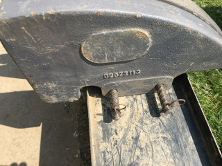 Rebar bracket to hold weights with hitch pin on ends so weights don’t vibrate off