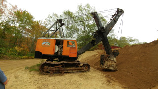 I got a tour of this. When the bucket dumps the falling dirt literally shakes the ground.